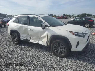 2022 Toyota RAV4 Hybrid XLE Premium with VIN JTMB6RFV4ND535282, listed as a Copart auction lot 61249445 with 82,398 mi miles and Salvage title. Bid and sale history available at DreamBid. Image 4.