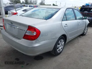 2004 Toyota Camry LE with VIN 4T1BE32K34U857725, listed as a IAAI auction lot 42131740 with 107,975 mi miles and . Bid and sale history available at DreamBid. Image 4.