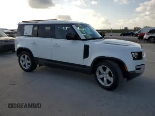 2023 Land Rover Defender S with VIN SALEJ7EXXP2124527, listed as a Copart auction lot 64578725 with 33,816 mi miles and Salvage title. Bid and sale history available at DreamBid. Image 4.