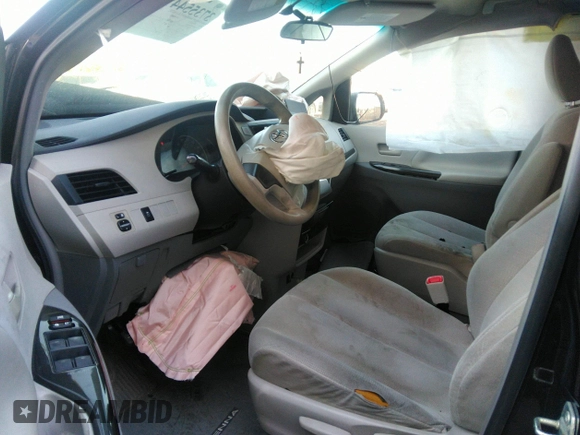 2014 Toyota Sienna L with VIN 5TDZK3DC2ES449563, listed as a IAAI auction lot 37355441 with 246,582 mi miles and . Bid and sale history available at DreamBid. Image 5.
