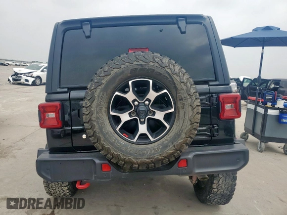 2020 Jeep Wrangler Rubicon with VIN 1C4HJXCG3LW212460, listed as a Copart auction lot 57546715 with 33,085 mi miles and Salvage title. Bid and sale history available at DreamBid. Image 6.
