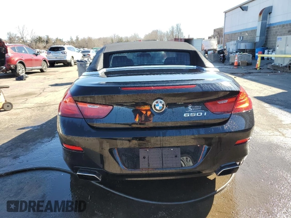 2012 BMW 6 Series 650i z VIN WBALZ3C57CDL73218, wystawiony jako Copart lot #49639975 z przebiegiem 54 408 mil mil oraz Szkoda całkowita • Salvage title. Historia ofert i sprzedaży dostępna na DreamBid. Obrazek 6.