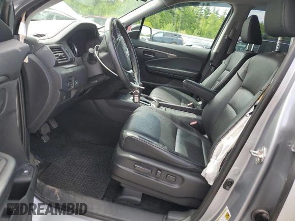 2019 Honda Ridgeline RTL with VIN 5FPYK3F57KB001594, listed as a Copart auction lot 59020335 with 31,465 mi miles and Salvage title. Bid and sale history available at DreamBid. Image 7.