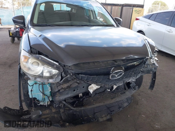 2014 Mazda CX-5 Touring with VIN JM3KE2CY9E0384401, listed as a IAAI auction lot 41699913 with 75,301 mi miles. Bid and sale history available at carsss.com. Image 6.