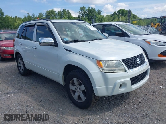 2010 Suzuki Grand Vitara XSport z VIN JS3TE0D48A4100189, wystawiony jako IAAI lot #42500701 z przebiegiem 135 346 mil mil oraz . Historia ofert i sprzedaży dostępna na DreamBid. Obrazek 1.