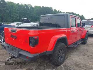 2023 Jeep Gladiator Sport S z VIN 1C6HJTAG4PL544871, wystawiony jako IAAI lot #42382428 z przebiegiem 33 453 mil mil oraz . Historia ofert i sprzedaży dostępna na DreamBid. Obrazek 4.