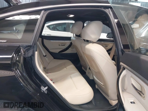 2018 BMW 4 Series 430i xDrive with VIN WBA4J3C56JBL03844, listed as a IAAI auction lot 40864200 with 56,115 mi miles and . Bid and sale history available at DreamBid. Image 8.