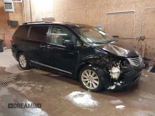 2015 Toyota Sienna Ltd with VIN 5TDDK3DCXFS122419, listed as a IAAI auction lot 41336752 with 243,567 mi miles. Bid and sale history available at carsss.com. Image 1.