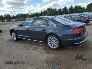 2012 Audi A8 z VIN WAURVAFD2CN021722, wystawiony jako Copart lot #58353745 z przebiegiem 117 302 mil mil oraz Szkoda całkowita • Salvage title. Historia ofert i sprzedaży dostępna na DreamBid. Obrazek 2.