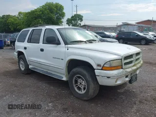 2000 Dodge Durango z VIN 1B4HS28N7YF260524, wystawiony jako IAAI lot #42798256 z przebiegiem 137 901 mil mil oraz . Historia ofert i sprzedaży dostępna na DreamBid. Obrazek 1.