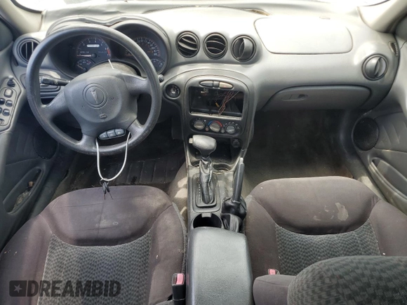 2004 Pontiac Grand Am SE1 with VIN 1G2NF52E74M687538, listed as a Copart auction lot 60922655 with 139,795 mi miles and Salvage title. Bid and sale history available at DreamBid. Image 8.