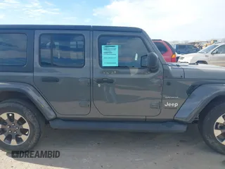 2018 Jeep Wrangler Unlimited Sahara z VIN 1C4HJXEN9JW215890, wystawiony jako IAAI lot #41215063 z przebiegiem 39 567 mil mil oraz . Historia ofert i sprzedaży dostępna na DreamBid. Obrazek 13.