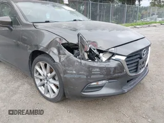 2017 Mazda 3 Touring with VIN 3MZBN1V73HM118104, listed as a IAAI auction lot 42139361 with 71,615 mi miles and . Bid and sale history available at DreamBid. Image 6.