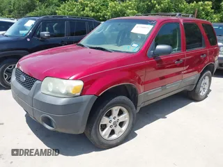 2005 Ford Escape XLT with VIN 1FMYU031X5KE17077, listed as a IAAI auction lot 42260075 with 234,758 mi miles and . Bid and sale history available at DreamBid. Image 2.