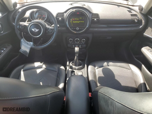 2016 MINI Cooper Clubman with VIN WMWLN5C53G2E29697, listed as a Copart auction lot 52791585 with 115,213 mi miles and Clean Title. Bid and sale history available at carsss.com. Image 8.