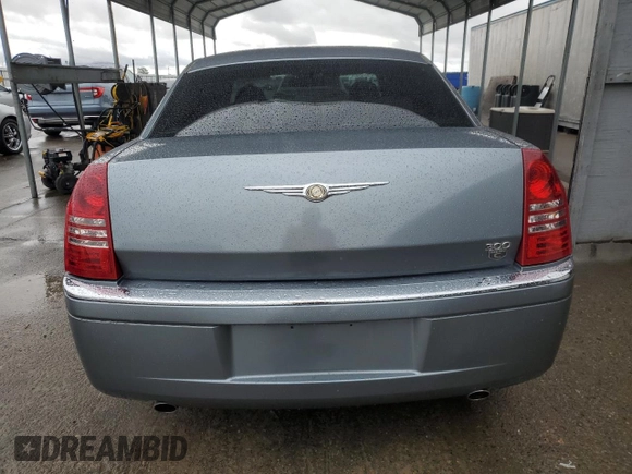 2006 Chrysler 300 C with VIN 2C3KA63H26H218136, listed as a Copart auction lot 49209315 with 215,682 mi miles and Salvage Title. Bid and sale history available at carsss.com. Image 6.