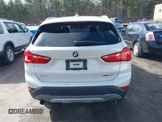 2019 BMW X1 xDrive28i with VIN WBXHT3C56K5L35842, listed as a IAAI auction lot 41981409 with 54,325 mi miles. Bid and sale history available at carsss.com. Image 16.
