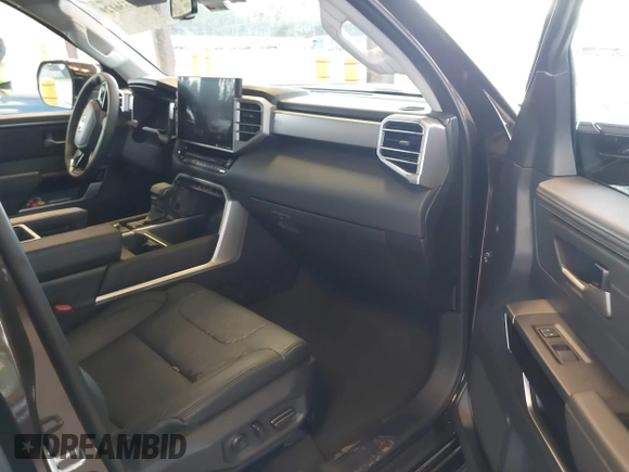2023 Toyota Tundra Limited with VIN 5TFJA5DB9PX125400, listed as a IAAI auction lot 41336129 with 12,384 mi miles and . Bid and sale history available at DreamBid. Image 5.