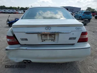 1999 Infiniti Q45 z VIN JNKBY31A2XM603477, wystawiony jako Copart lot #64216924 z przebiegiem 278 602 mil mil oraz Szkody całkowita. Historia ofert i sprzedaży dostępna na DreamBid. Obrazek 6.