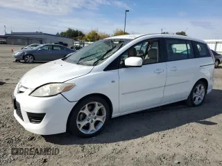 2009 Mazda 5 Grand Touring with VIN JM1CR29L290329503, listed as a Copart auction lot 78183844 with 118,798 mi miles and Salvage Title. Bid and sale history available at DreamBid. Image 1.