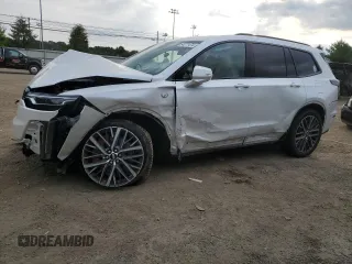 2022 Cadillac XT6 Sport with VIN 1GYKPGRS4NZ174846, listed as a Copart auction lot 64271474 with 57,891 mi miles and Salvage Title. Bid and sale history available at carsss.com. Image 1.