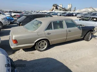 1989 Mercedes-Benz 560 with VIN WDBCA39E8KA469603, listed as a Copart auction lot 82986634 with 81,490 mi miles and Clean Title. Bid and sale history available at DreamBid. Image 3.