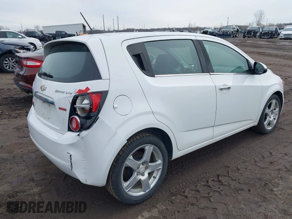 2016 Chevrolet Sonic LTZ z VIN 1G1JE6SB9G4146075, wystawiony jako IAAI lot #41750534 z przebiegiem 103 240 mil mil oraz . Historia ofert i sprzedaży dostępna na DreamBid. Obrazek 4.