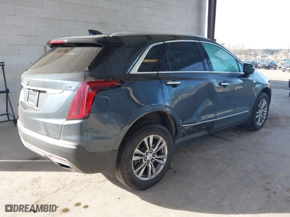 2021 Cadillac XT5 AWD Premium Luxury with VIN 1GYKNDRS3MZ139802, listed as a IAAI auction lot 41698772 with 62,886 mi miles. Bid and sale history available at carsss.com. Image 4.