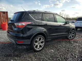2017 Ford Escape Titanium with VIN 1FMCU0J92HUB12281, listed as a Copart auction lot 49615875 with 126,590 mi miles and Salvage Title. Bid and sale history available at carsss.com. Image 3.