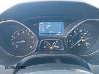 2014 Ford Focus SE z VIN 1FADP3K24EL399942, wystawiony jako IAAI lot #41697216 z przebiegiem 112 393 mil mil oraz . Historia ofert i sprzedaży dostępna na DreamBid. Obrazek 7.
