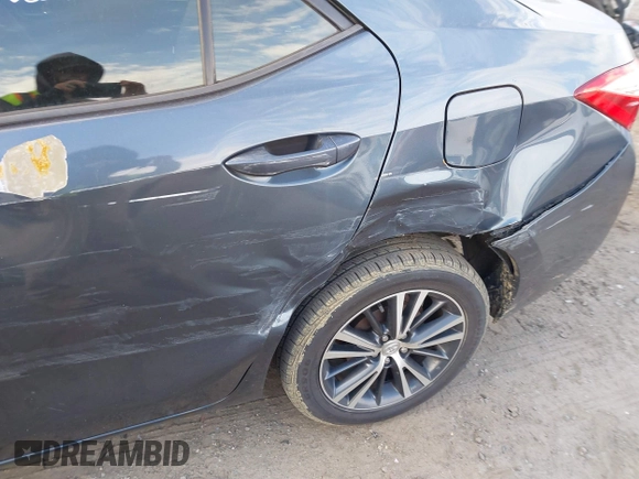 2017 Toyota Corolla L with VIN 2T1BURHEXHC814658, listed as a IAAI auction lot 41696935 with 94,598 mi miles and . Bid and sale history available at DreamBid. Image 18.