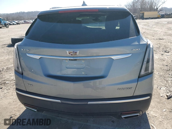 2023 Cadillac XT5 AWD Sport with VIN 1GYKNGRS7PZ133622, listed as a Copart auction lot 48342095 with 63,008 mi miles and Salvage title. Bid and sale history available at DreamBid. Image 6.