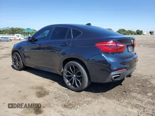2015 BMW X6 xDrive35i with VIN 5UXKU2C53F0F96232, listed as a Copart auction lot 65198963 with 116,024 mi miles. Bid and sale history available at carsss.com. Image 2.