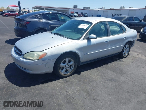 2003 Ford Taurus SE Standard with VIN 1FAFP53UX3G268265, listed as a IAAI auction lot 42090151 with 139,734 mi miles. Bid and sale history available at carsss.com. Image 2.