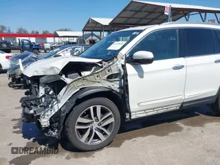 2016 Honda Pilot Touring with VIN 5FNYF6H9XGB005516, listed as a IAAI auction lot 41975049 with 85,217 mi miles. Bid and sale history available at carsss.com. Image 6.