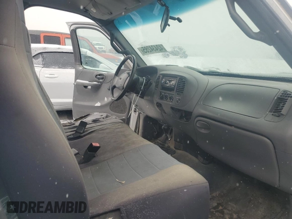 2001 Ford F-150 XL with VIN 2FTPF18Z81CA84228, listed as a Copart auction lot 42434285 with 83,435 mi miles and Salvage title. Bid and sale history available at DreamBid. Image 11.
