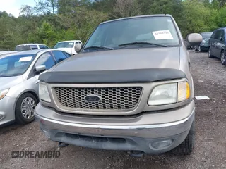 2003 Ford F-150 XLT with VIN 1FTRW08L63KD06455, listed as a IAAI auction lot 41988549 with 138,168 mi miles. Bid and sale history available at carsss.com. Image 12.