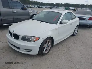 2010 BMW 1 Series 128i with VIN WBAUP9C58AVL89335, listed as a IAAI auction lot 41853847 with Not Provided miles and . Bid and sale history available at carsss.com. Image 2.