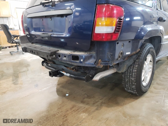 2002 Jeep Grand Cherokee Laredo with VIN 1J8GW48S92C197903, listed as a Copart auction lot 70524292 with 152,286 mi miles and Non Repairable. Bid and sale history available at carsss.com. Image 9.