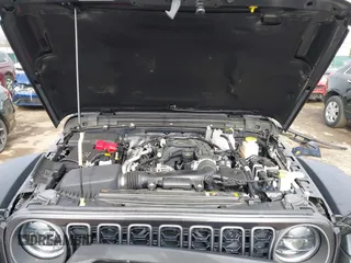 2024 Jeep Gladiator Rubicon z VIN 1C6JJTBG5RL110669, wystawiony jako IAAI lot #41694630 z przebiegiem 1 189 mil mil oraz . Historia ofert i sprzedaży dostępna na DreamBid. Obrazek 10.