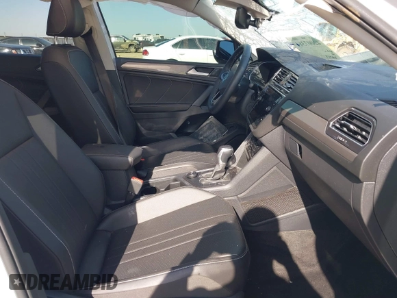 2022 Volkswagen Tiguan SE with VIN 3VV2B7AX2NM010932, listed as a IAAI auction lot 42007364 with 26,014 mi miles and . Bid and sale history available at DreamBid. Image 5.