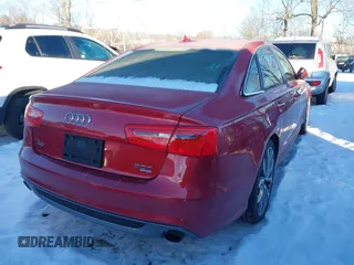 2013 Audi A6 3.0T Prestige with VIN WAUJGAFC5DN030463, listed as a IAAI auction lot 41304345 with 134,216 mi miles. Bid and sale history available at carsss.com. Image 4.