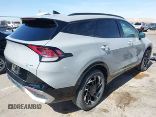 2024 Kia Sportage SX-Prestige with VIN 5XYK5CDF1RG143931, listed as a IAAI auction lot 42236962 with 23,461 mi miles and . Bid and sale history available at DreamBid. Image 4.