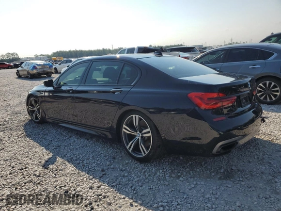 2019 BMW 7 Series 740i with VIN WBA7E2C50KB216499, listed as a Copart auction lot 68828673 with 94,549 mi miles. Bid and sale history available at carsss.com. Image 2.