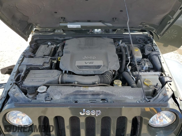 2015 Jeep Wrangler Unlimited Rubicon with VIN 1C4BJWFGXFL752602, listed as a Copart auction lot 54102395 with 26,466 mi miles and Salvage title. Bid and sale history available at DreamBid. Image 12.