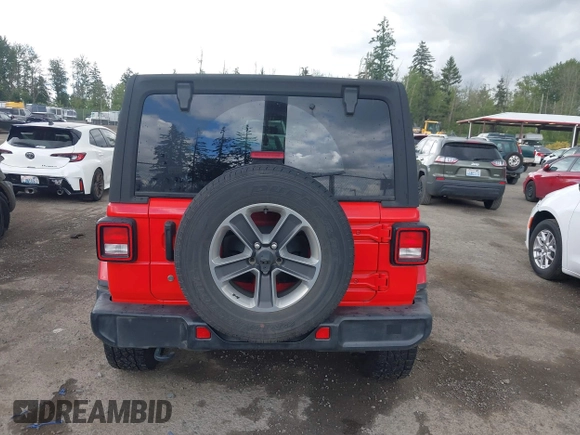 2018 Jeep Wrangler Unlimited Sahara with VIN 1C4HJXEG1JW310817, listed as a IAAI auction lot 42248374 with 64,516 mi miles and . Bid and sale history available at DreamBid. Image 17.