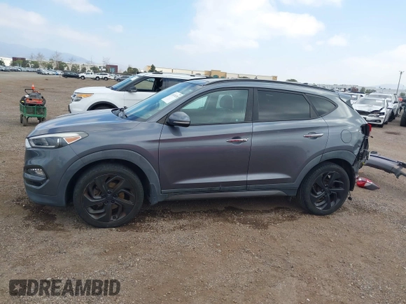 2016 Hyundai Tucson Eco with VIN KM8J3CA28GU217033, listed as a IAAI auction lot 41476238 with 76,311 mi miles. Bid and sale history available at carsss.com. Image 15.