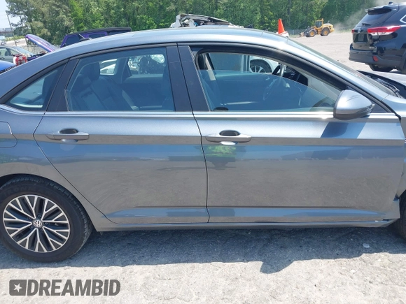 2019 Volkswagen Jetta SEL z VIN 3VWE57BU0KM110267, wystawiony jako IAAI lot #42161272 z przebiegiem 63 955 mil mil oraz . Historia ofert i sprzedaży dostępna na DreamBid. Obrazek 13.