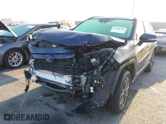 2024 Toyota RAV4 Hybrid XLE Premium with VIN JTMB6RFV0RD141316, listed as a IAAI auction lot 41980384 with 13,270 mi miles and . Bid and sale history available at DreamBid. Image 2.