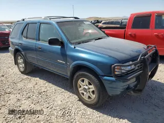 2001 Isuzu Rodeo S z VIN 4S2DM58W014344342, wystawiony jako Copart lot #60161365 z przebiegiem Nie podano mil oraz Czysty tytuł • Clean title. Historia ofert i sprzedaży dostępna na DreamBid. Obrazek 4.